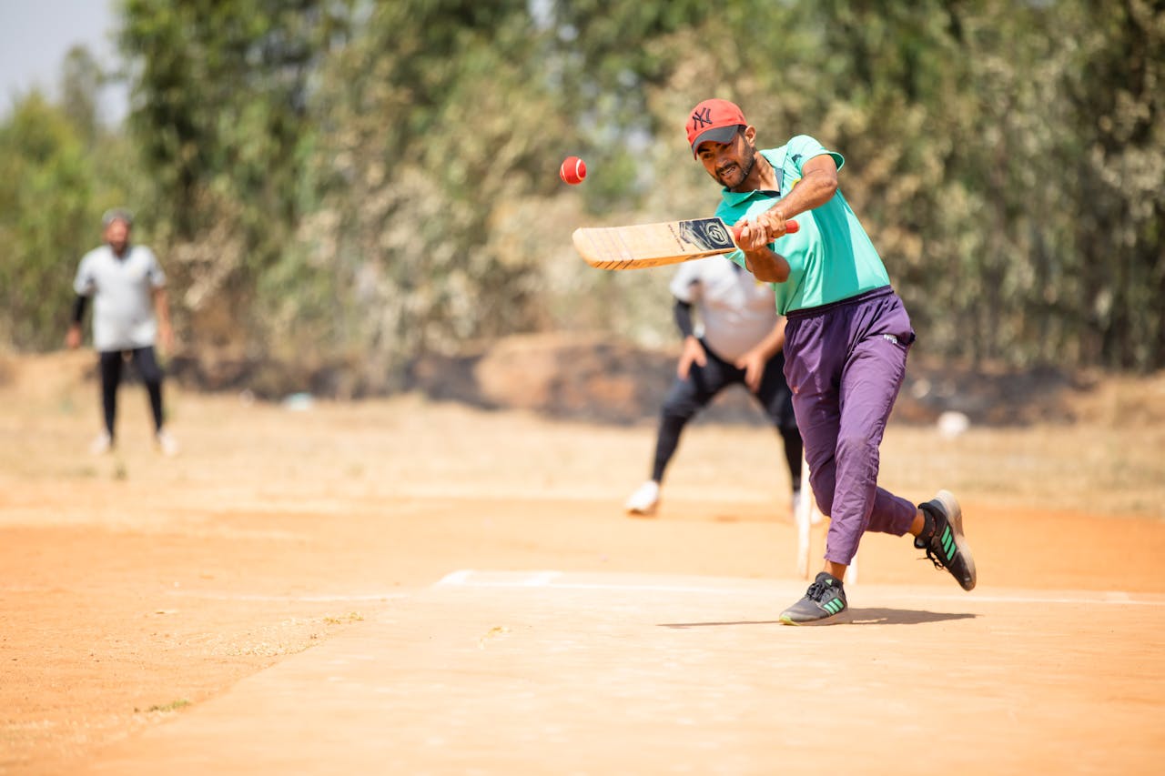 Man Playing Cricket Match